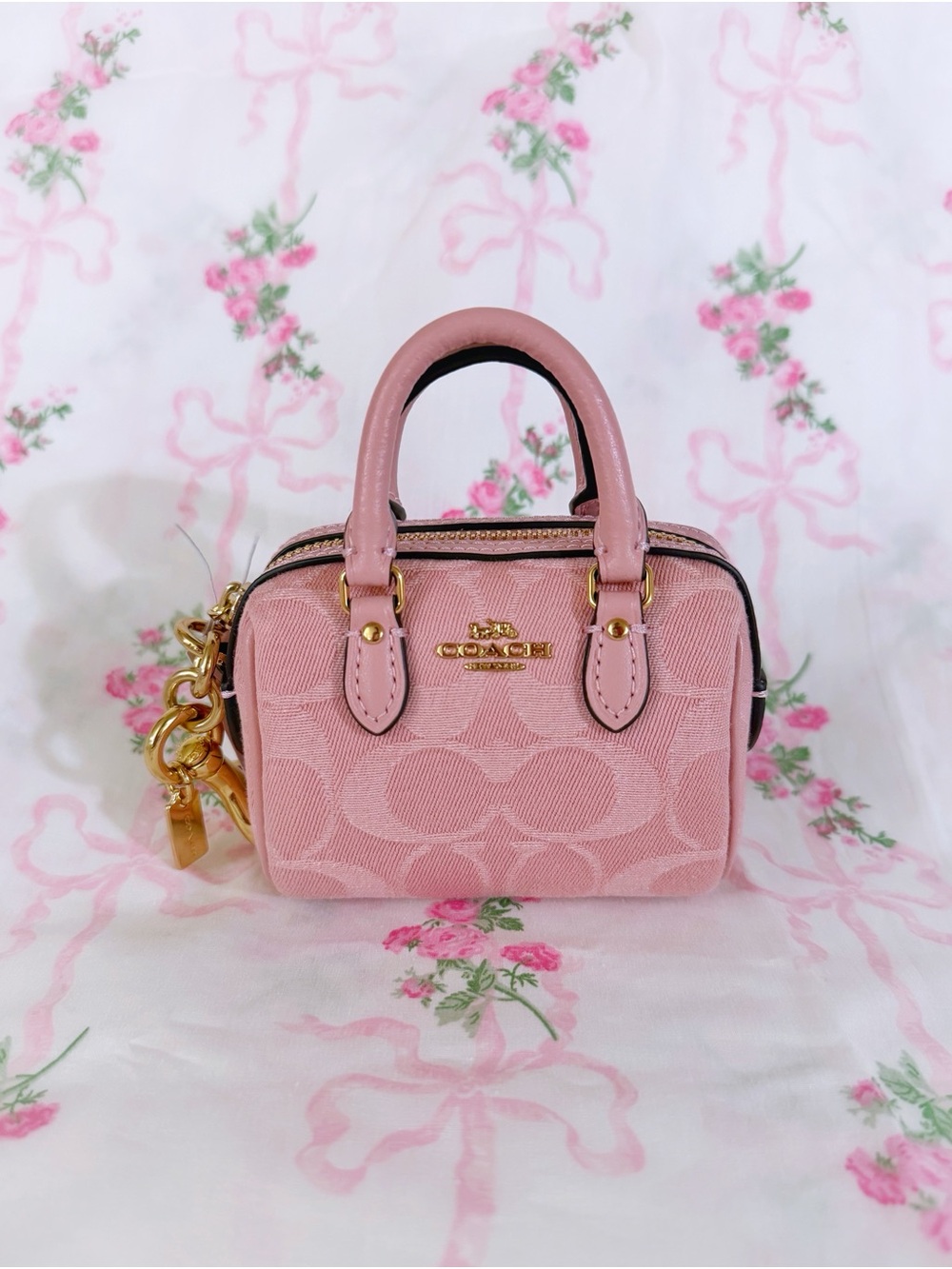 Coach Mini Rowan Bag Charm
In Light Pink Signature Denim